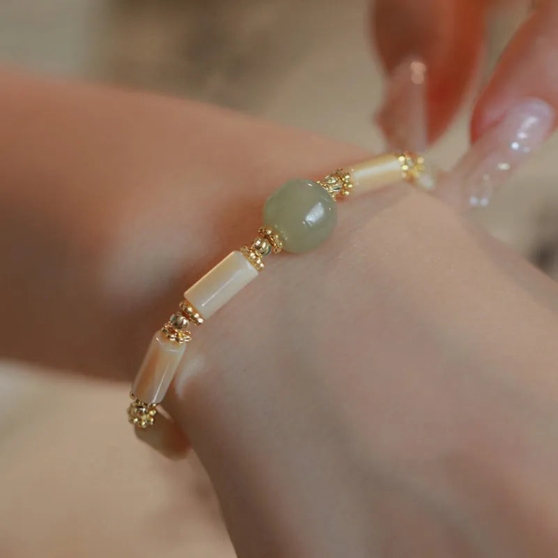 Women's Hetian jade bracelet with white round beads in simple geometric design