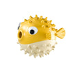 Yellow fish-shaped dog chew toy with textured surface and squeaker for aggressive chewers