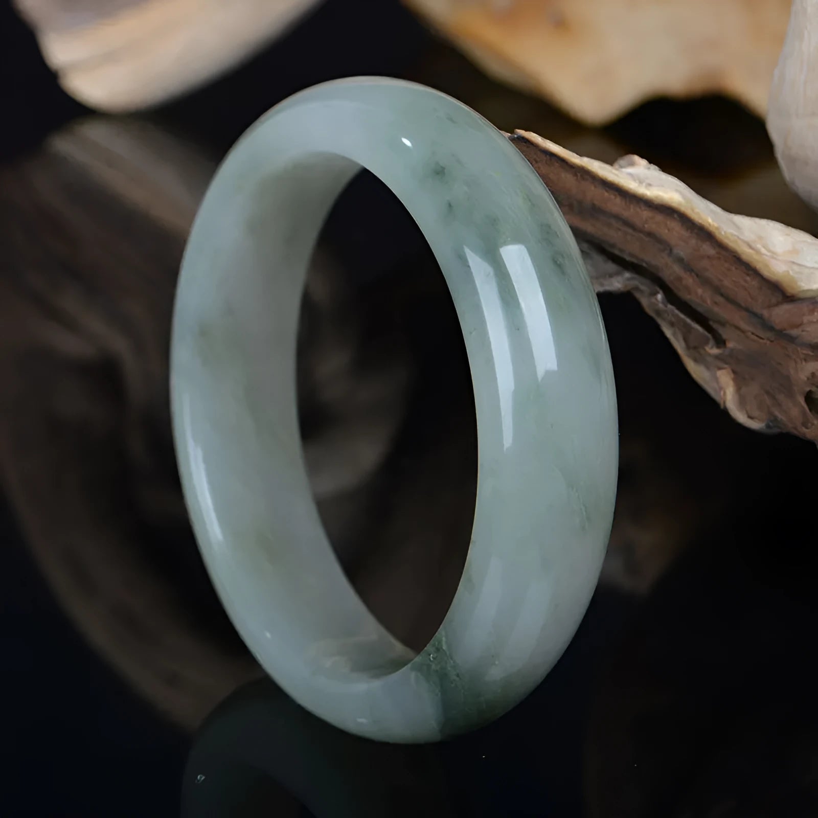 Natural Jinsi Jade Chinese style bracelet showing its solid construction on a neutral background.