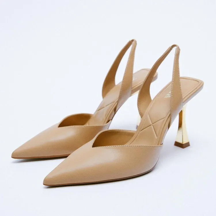Women's glossy patent leather pointed toe high heels in black and apricot colours.