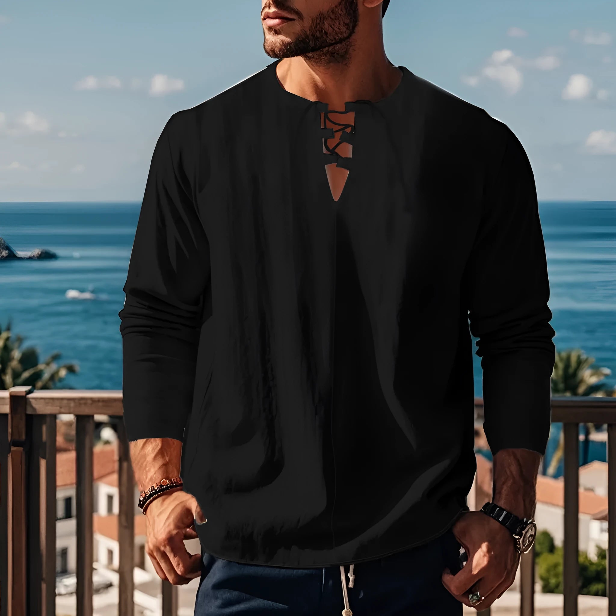 Man wearing a loose fit solid colour cotton linen beach shirt in a casual setting.
