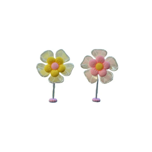 Cute plastic swing car decoration in blue, showing approximate 5cm height.