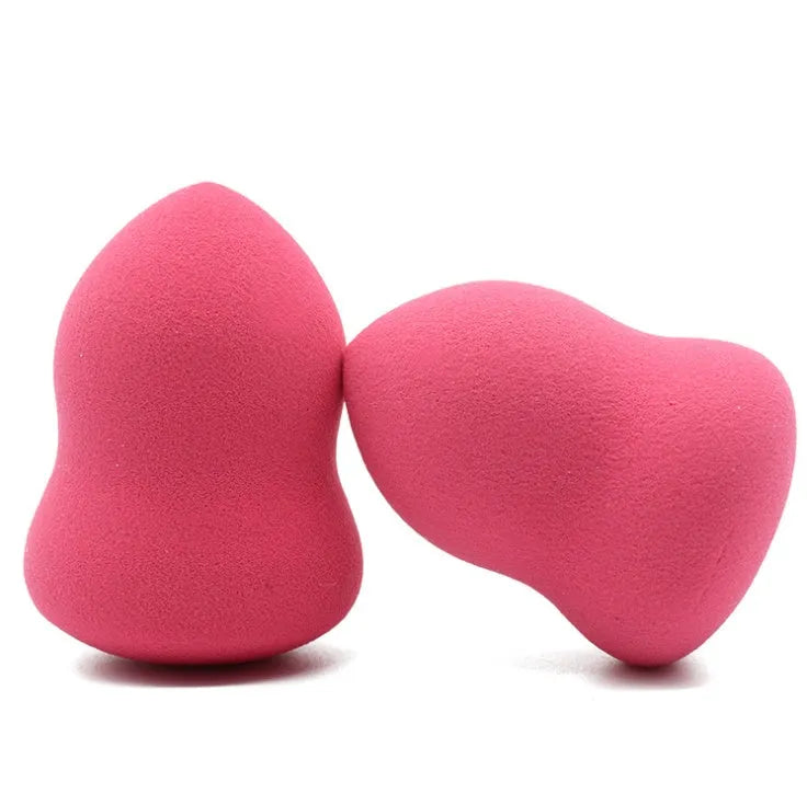 Pink non-latex makeup sponge for foundation application measuring 4x4x5.6 cm