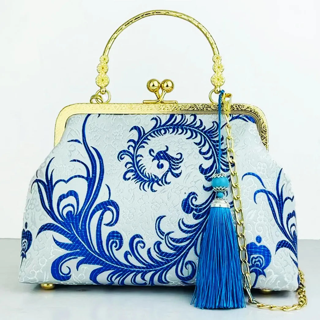 Chinese embroidery cheongsam handbag in polyester with shell shape and internal zipper compartment