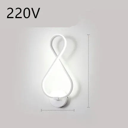 Minimalist Nordic design LED wall lamp with a silicone shade, mounted on a bedroom wall.