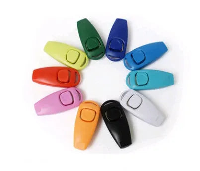 Plastic two-in-one pet ring and whistle dog training tool in black on white background