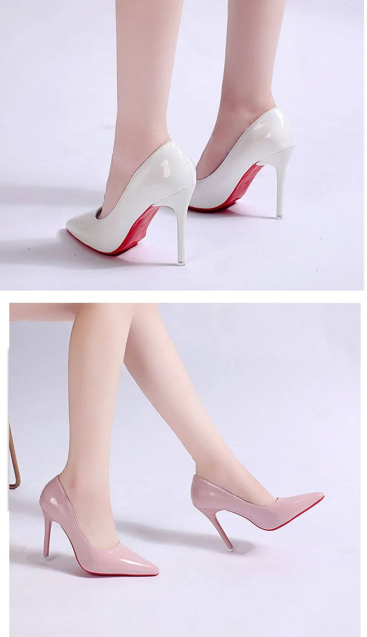 Women's black stiletto heel pump with pointed toe and shallow mouth opening on a white background.