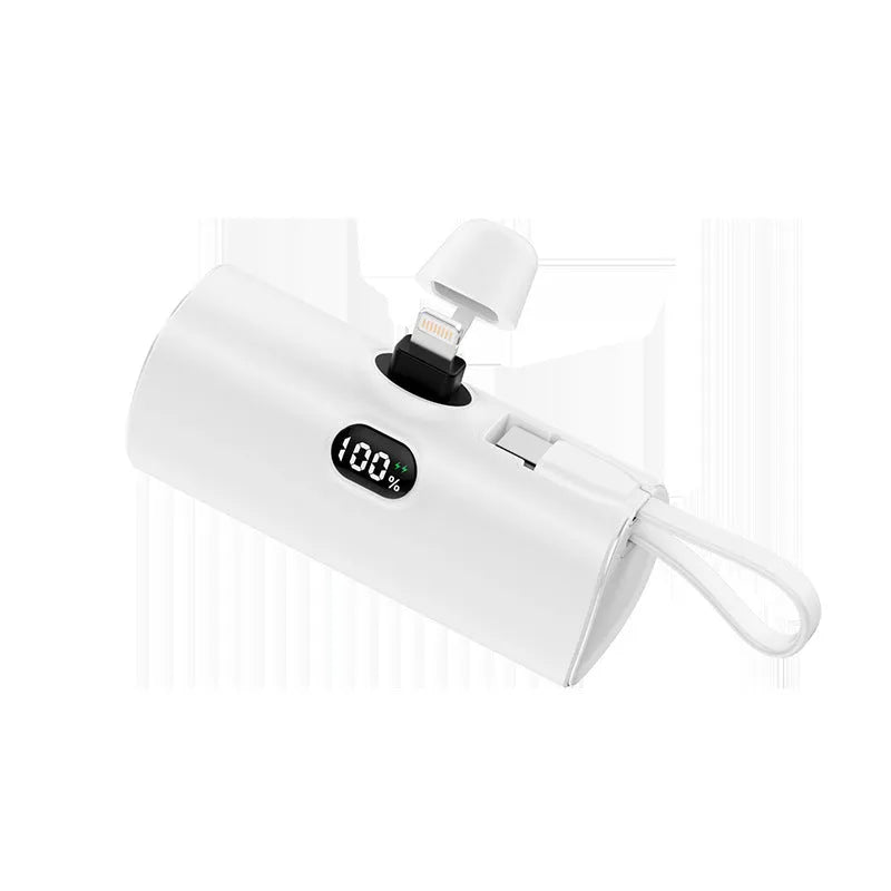 Capsule-shaped digital display power bank with folding plug in multiple colours.