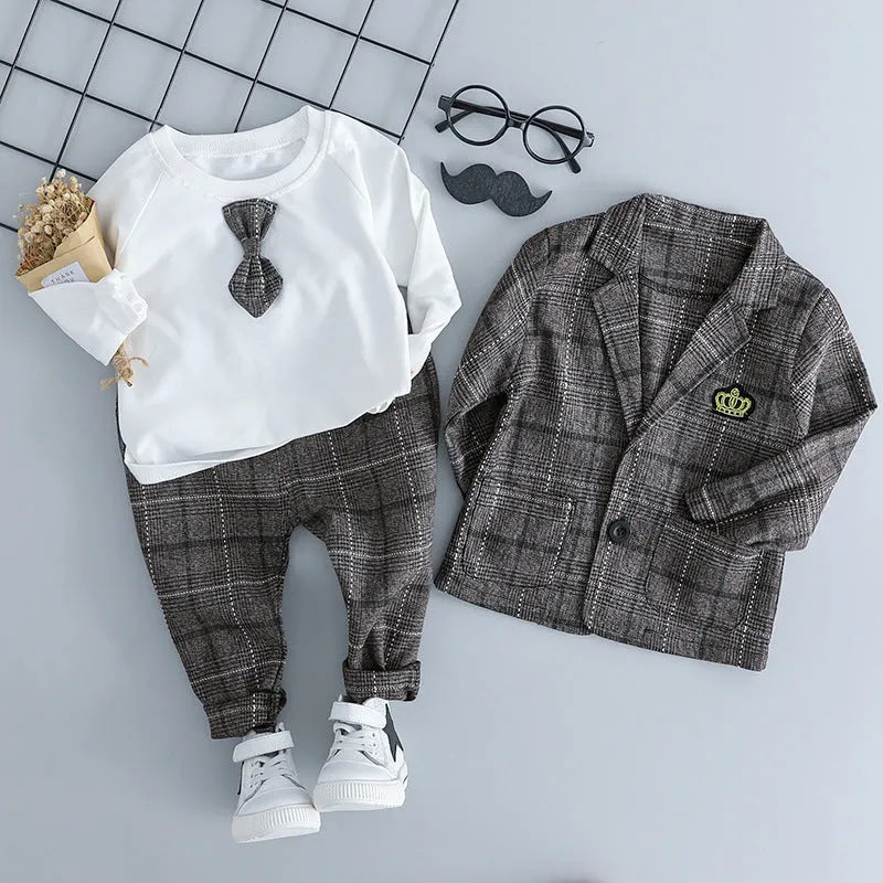 Grey cotton three-piece suit for a toddler boy on a hanger.