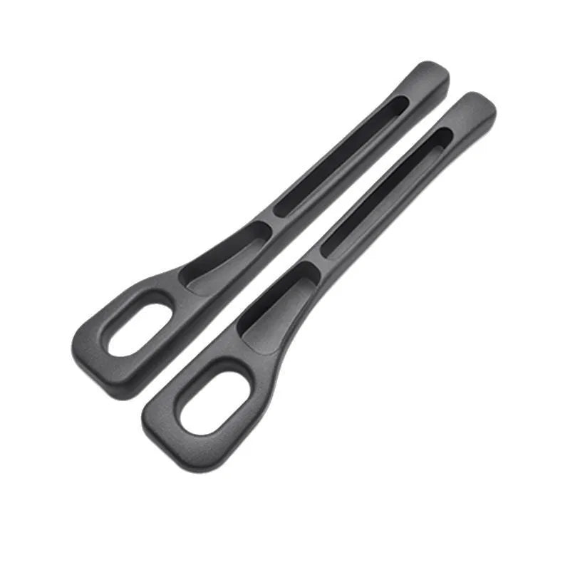 Leak-proof car seat gap filler strip in black installed between driver seat and centre console