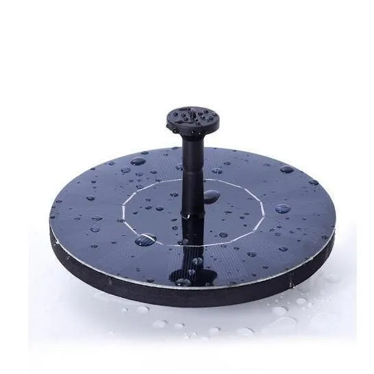 Black solar garden fountain pump with panel and four spray nozzles on grass