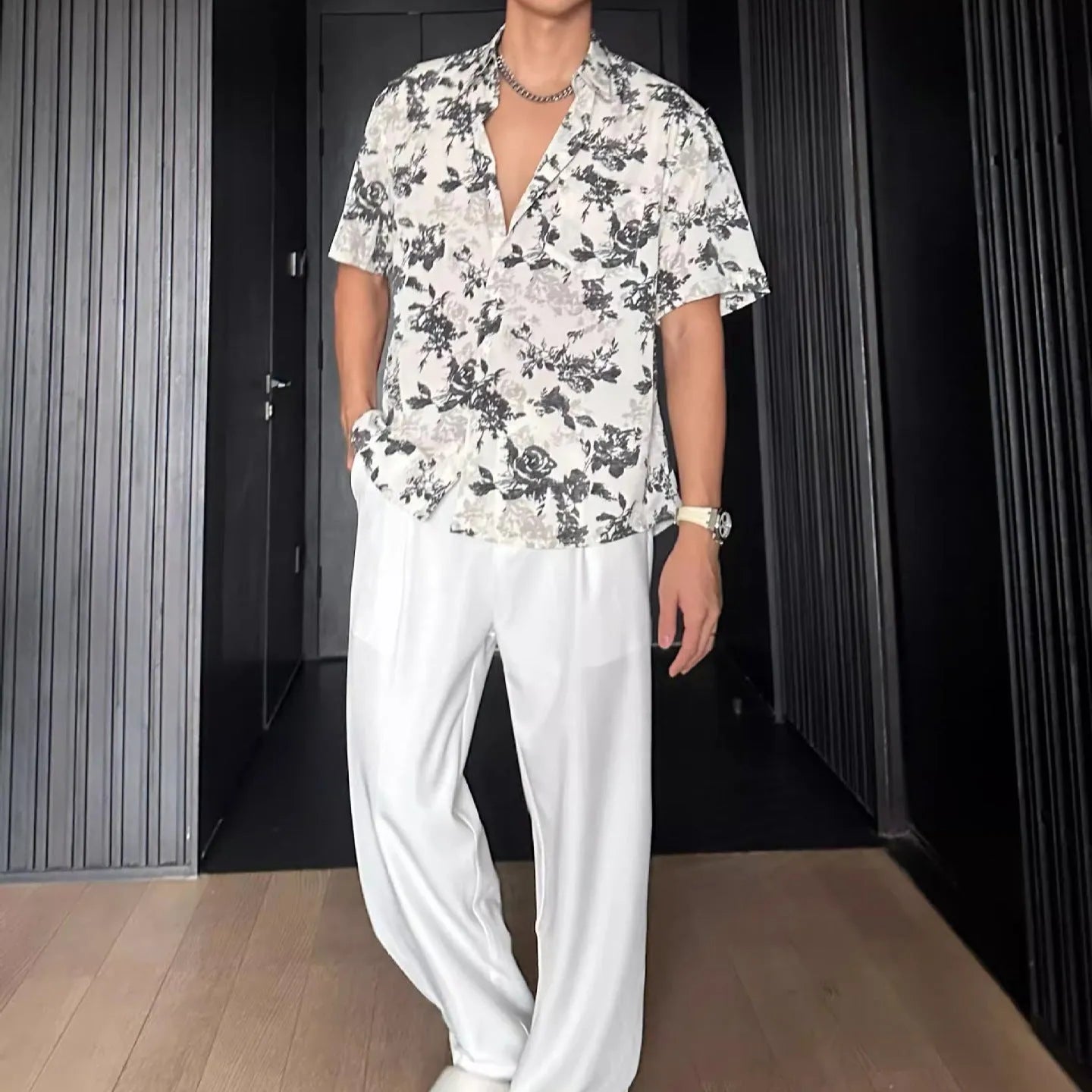 Men's loose fit short sleeve shirt with floral print in black or white colour options