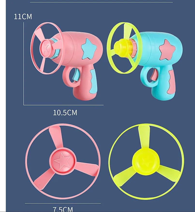 Blue flying saucer launcher gun and three LED flashing discs on a yellow background.