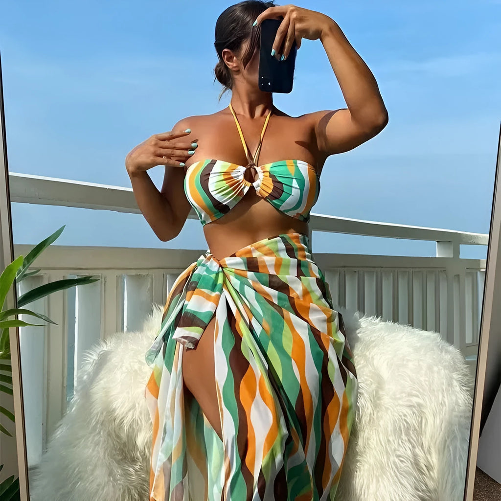 Yellow green women's split swimsuit three-piece set with printed beach skirt.