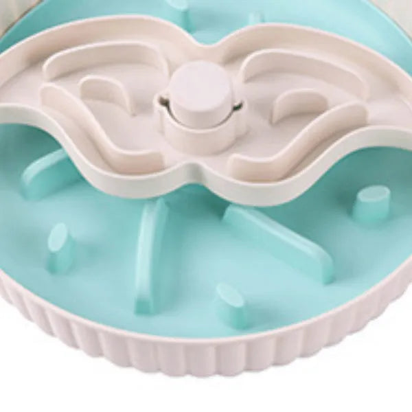 Slow feeder dog bowl with rotating game board and textured silicone licking mat insert.