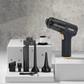 Black wireless handheld vacuum cleaner with multiple nozzles for car and home cleaning.