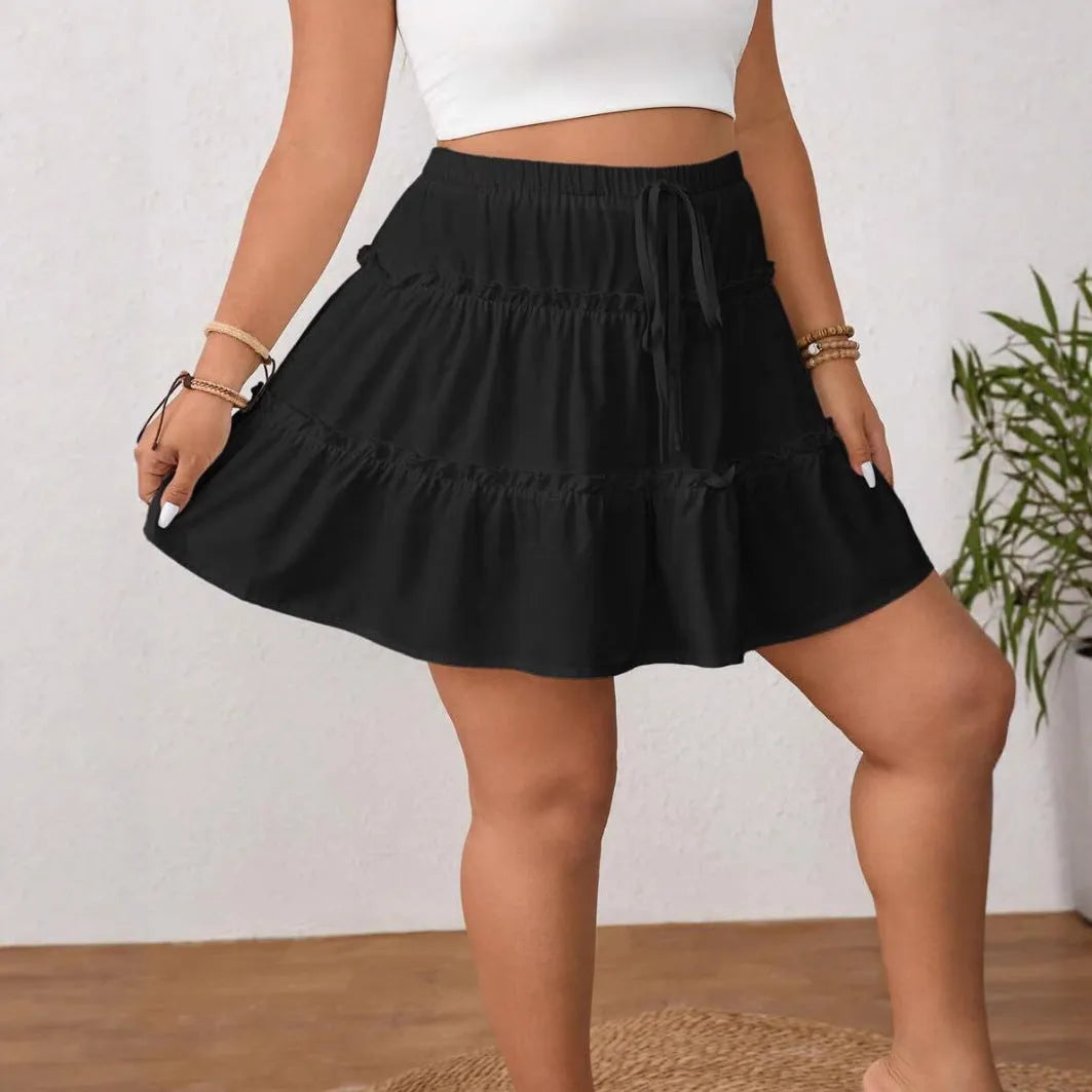 White pleated A-line skirt with lace-up front closure in milk silk sanding polyester fabric