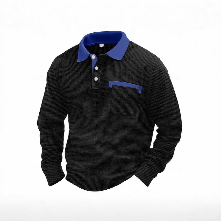 Man wearing a dark green waffle-knit long-sleeved polo shirt with an asymmetric design detail.