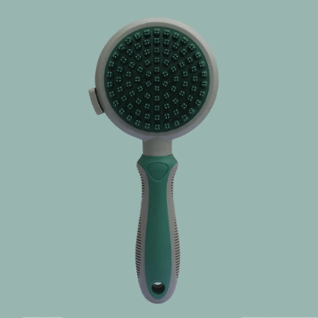 Double-sided pink cat brush with flea comb on reverse side and release button