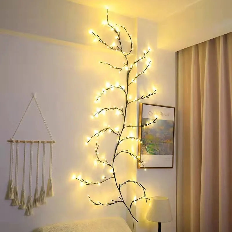 Flexible LED willow vine garland with birch bark texture and 144 warm white lights on 2.3m branch