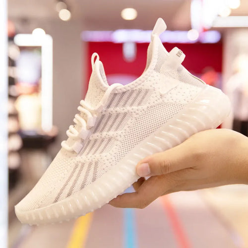 Men's white low-top platform sports shoes made from breathable flying fabric with a round toe and mesh lining.