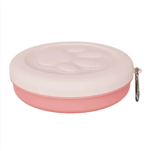 Portable outdoor dog food and water bowl in pink and green colour options.