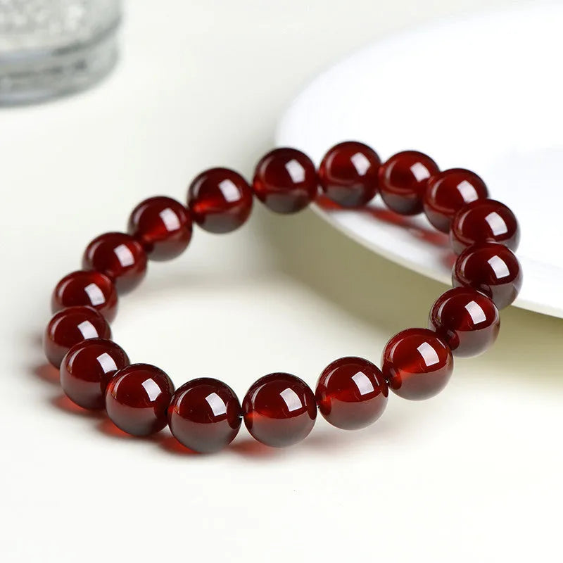 Natural orange red garnet crystal bracelet with ruyi motif in retro unisex design