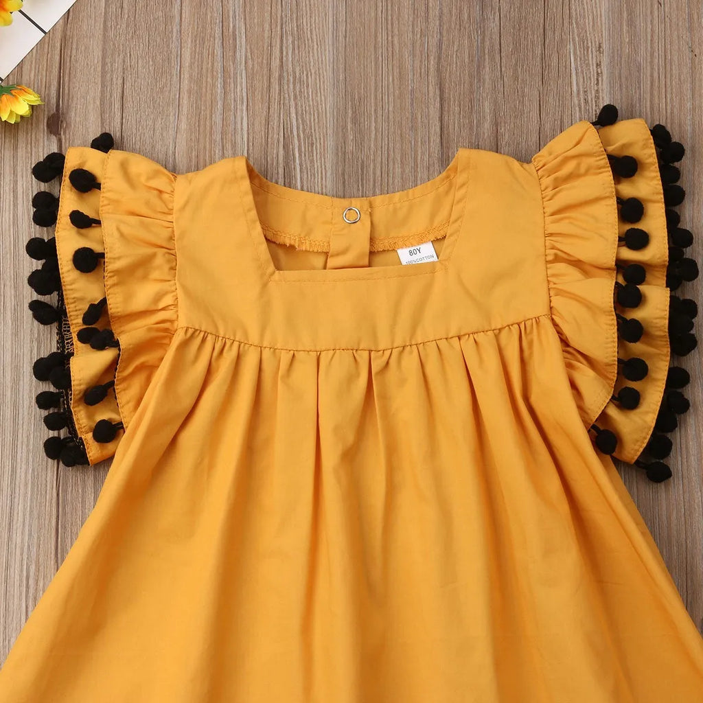 Sleeveless orange cotton girls dress for toddlers and children sizes 12M to 5T