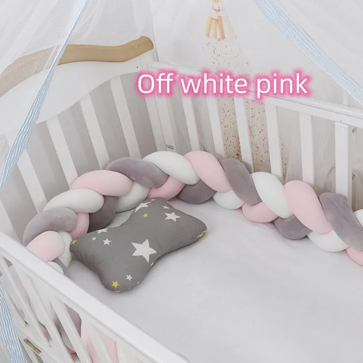 Baby cot bumper braid in spandex crystal velvet, shown in a light grey colour, wrapped around white crib rails.