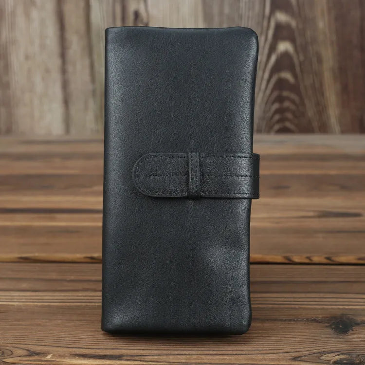Genuine leather women's wallet in black showing vertical style with multiple card slots