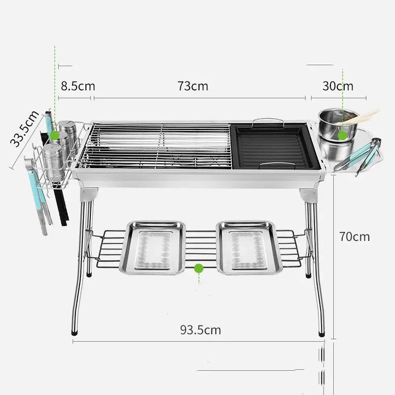 Large stainless steel folding portable barbecue oven with grill, shown outdoors.
