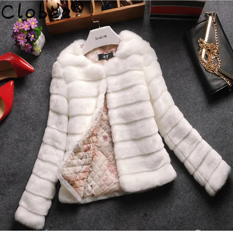 Woman wearing a short white faux fur top with regular sleeves, style suitable for street fashion.