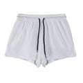 Men's black quick-drying nylon summer shorts on a mid-waist fit model.