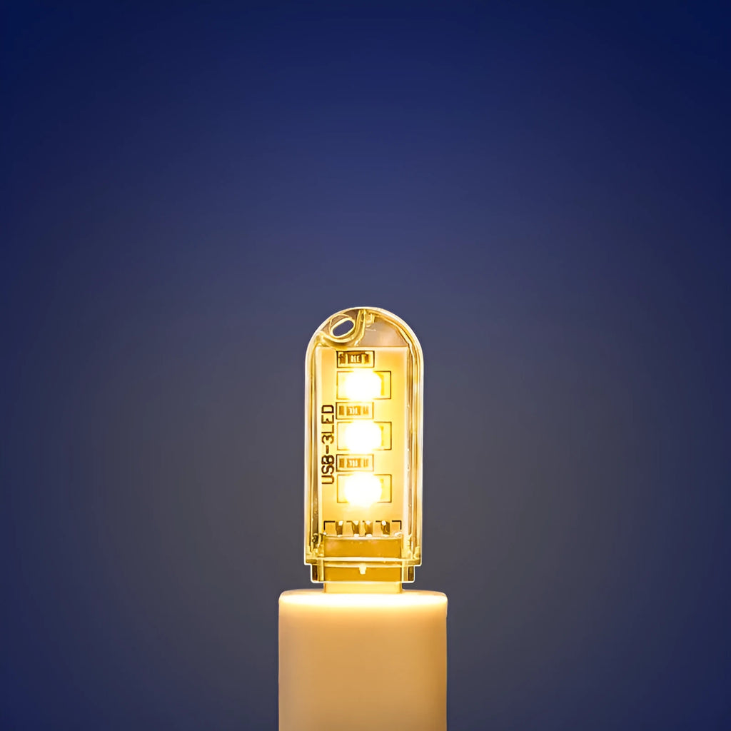 Small LED baby night light with USB cable, white PC housing, 6 centimetres long