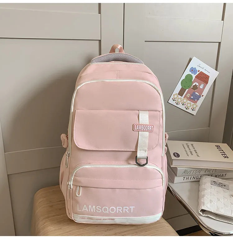 High school student backpack in waterproof nylon with curved shoulder straps and under 20L capacity