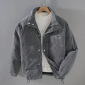 Men's puffer jacket in black with patch pockets, cardigan style, side view