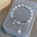 Women's cat's eye stone beaded bracelet with diamond-shaped opal beads and electroplated metal clasp in one of sixteen colour options