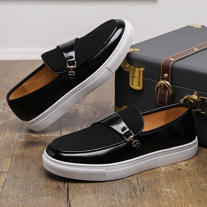 Men's black artificial leather slip-on shoes with a gold horsebit buckle and round toe on a rubber sole.