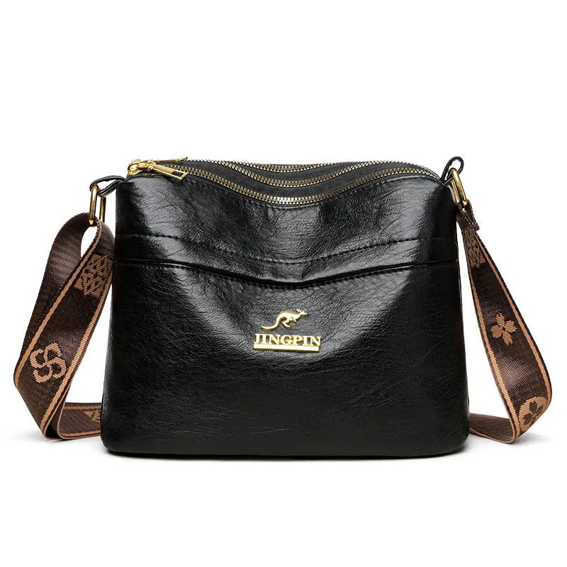 PU leather cross body messenger bag with multiple compartments in horizontal square suitcase shape