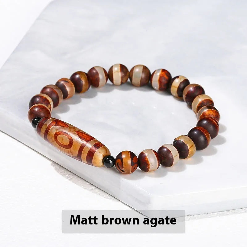 Handmade green dzi bead bracelet with barrel-shaped agate beads in unisex national style design