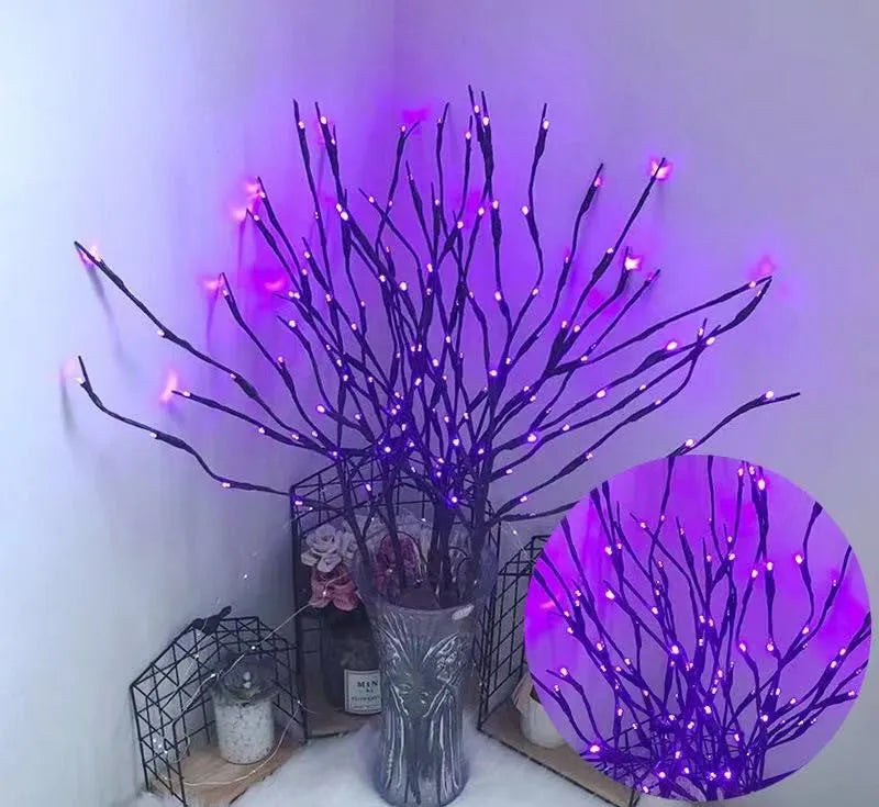 LED decorative tree light with silver artificial branches in vase base showing multiple colour options