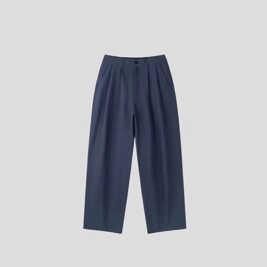 Men's light-weight apricot wide-leg cotton linen trousers with a non-iron finish on a hanger.