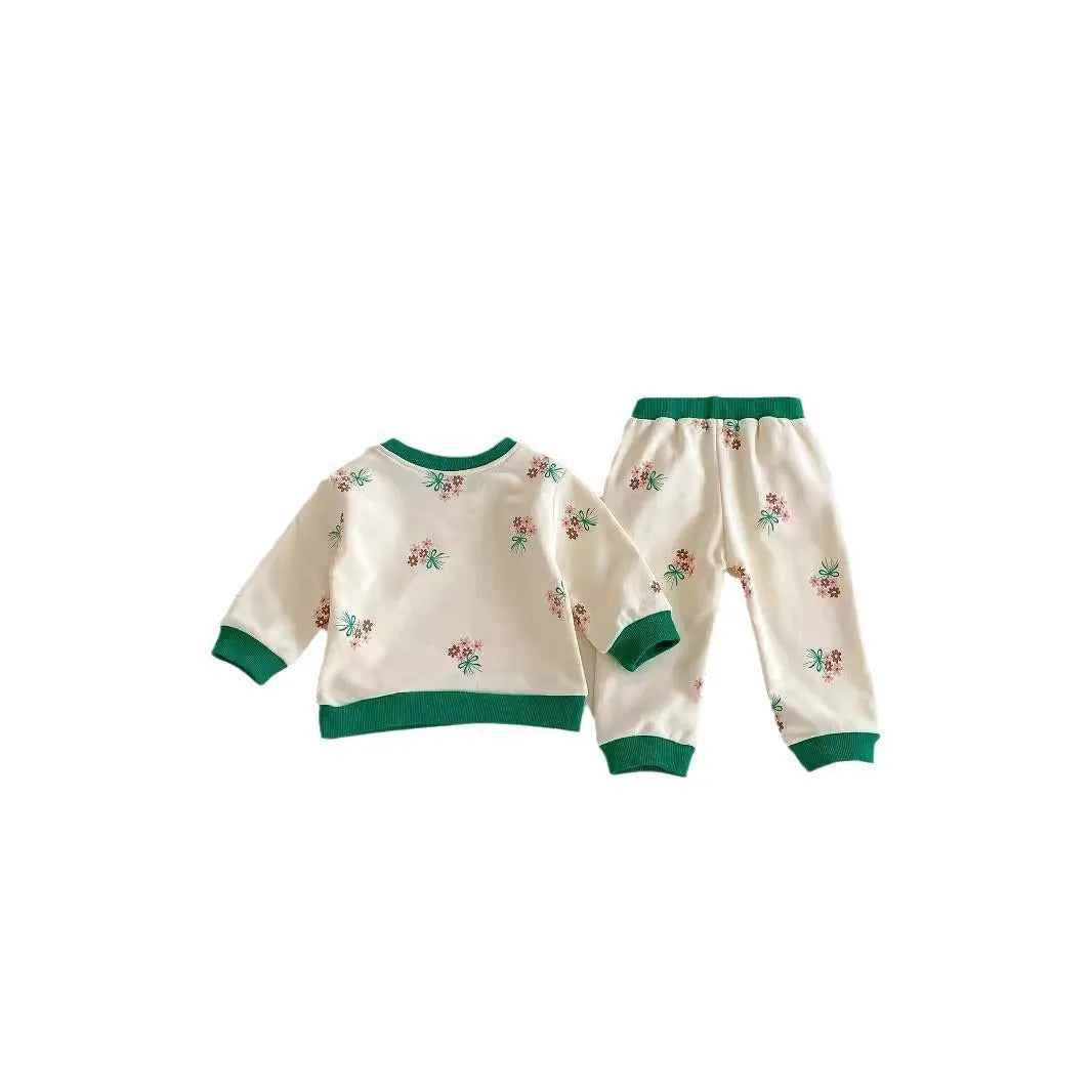 Baby cotton suit set in green with long sleeves and pants, front view