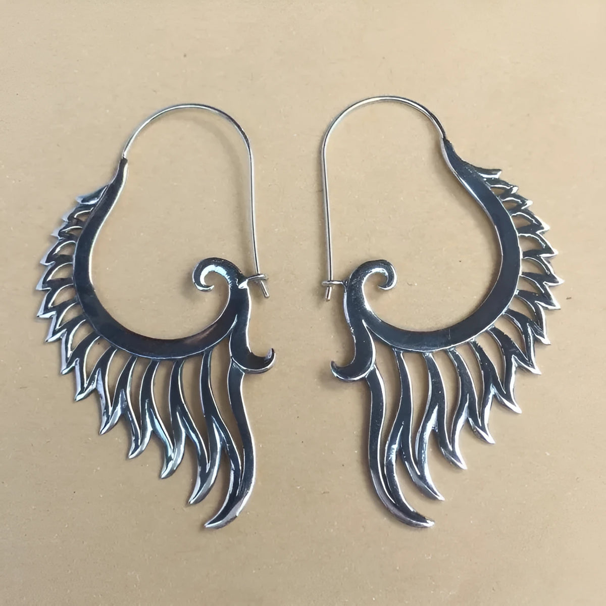 Silver retro creative women's earrings made from electroplated alloy in fashion OL style