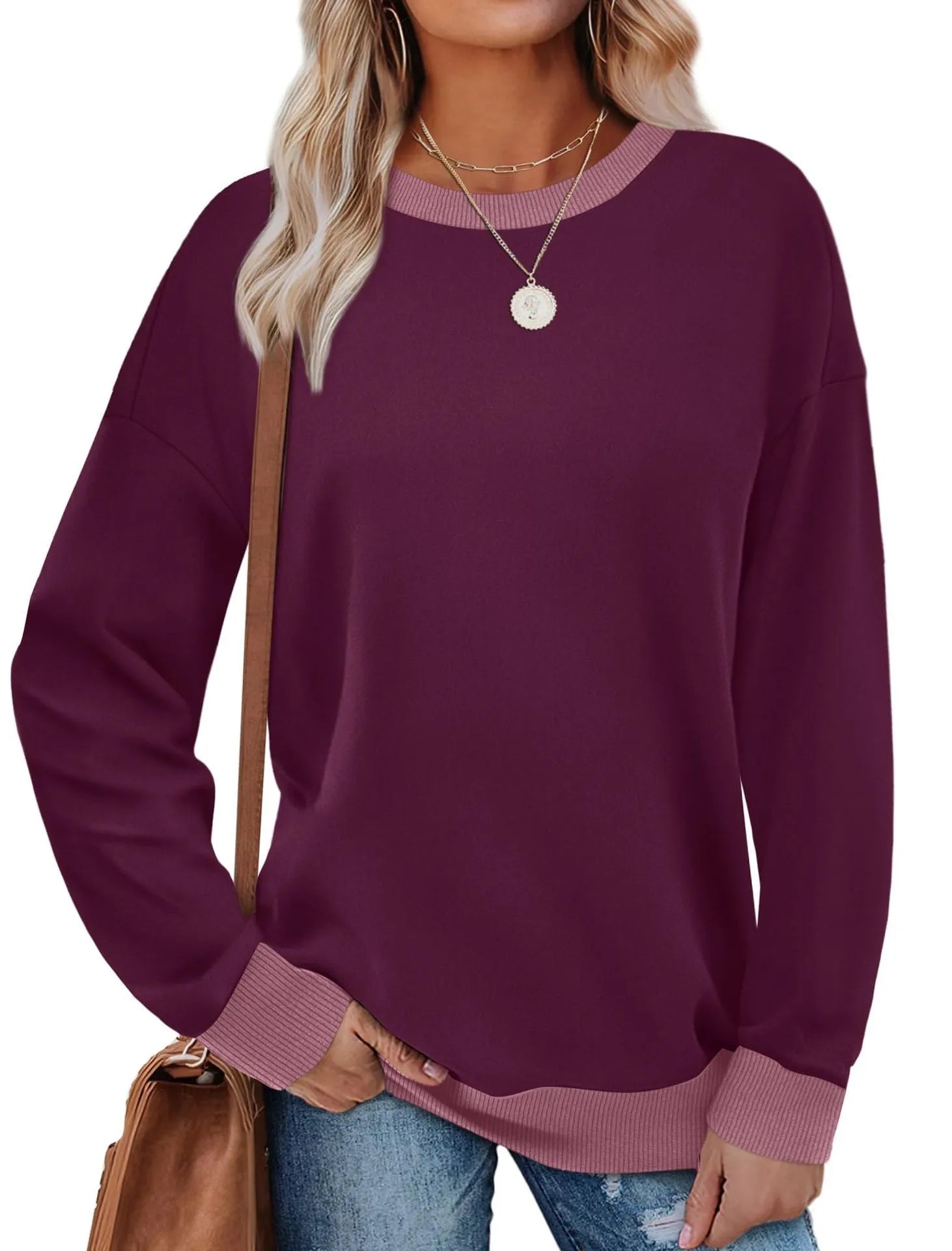Women's loose striped long-sleeved top in polyester fabric showing round neck and seven colour options