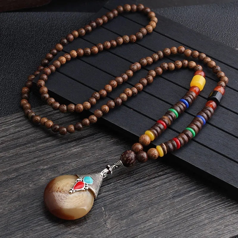 Unisex handmade long bead necklace with Bodhi pendant on chain