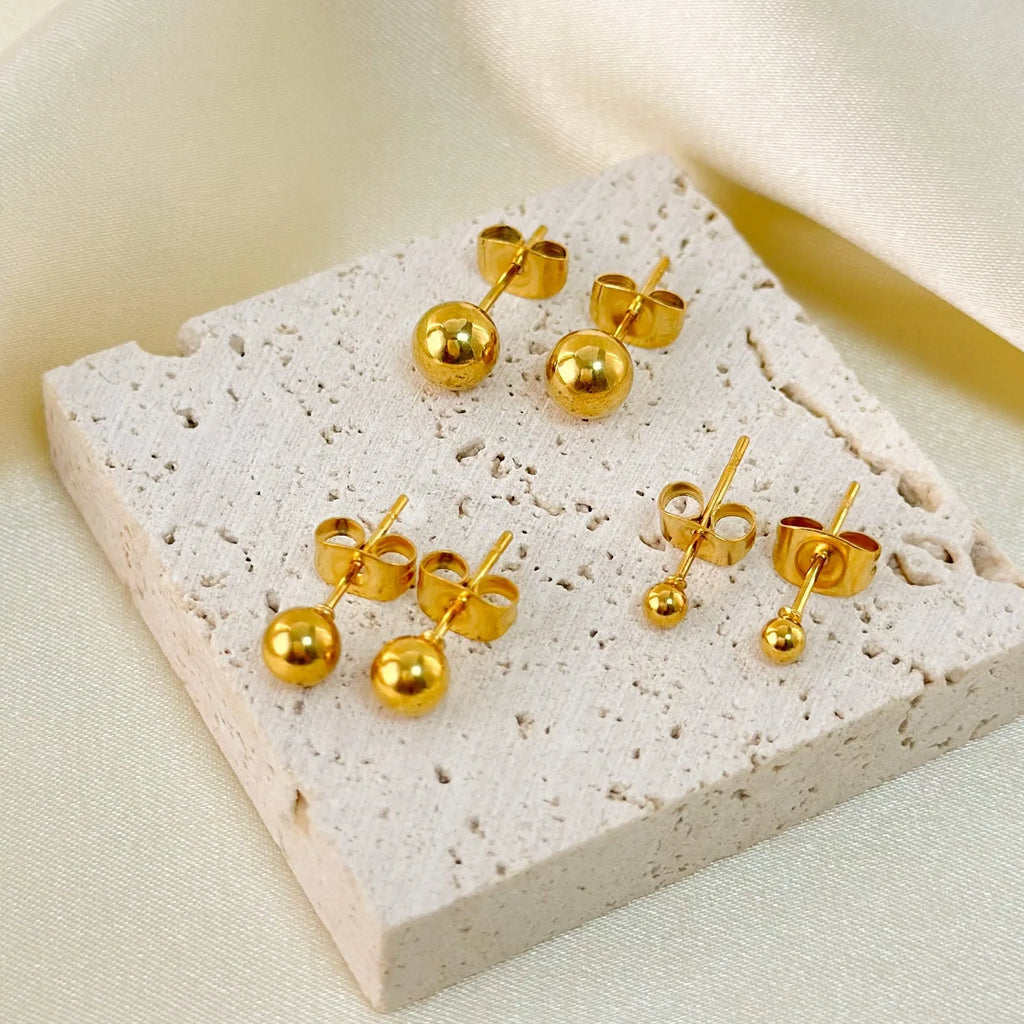 Stainless steel ball stud earrings in minimalist geometric design