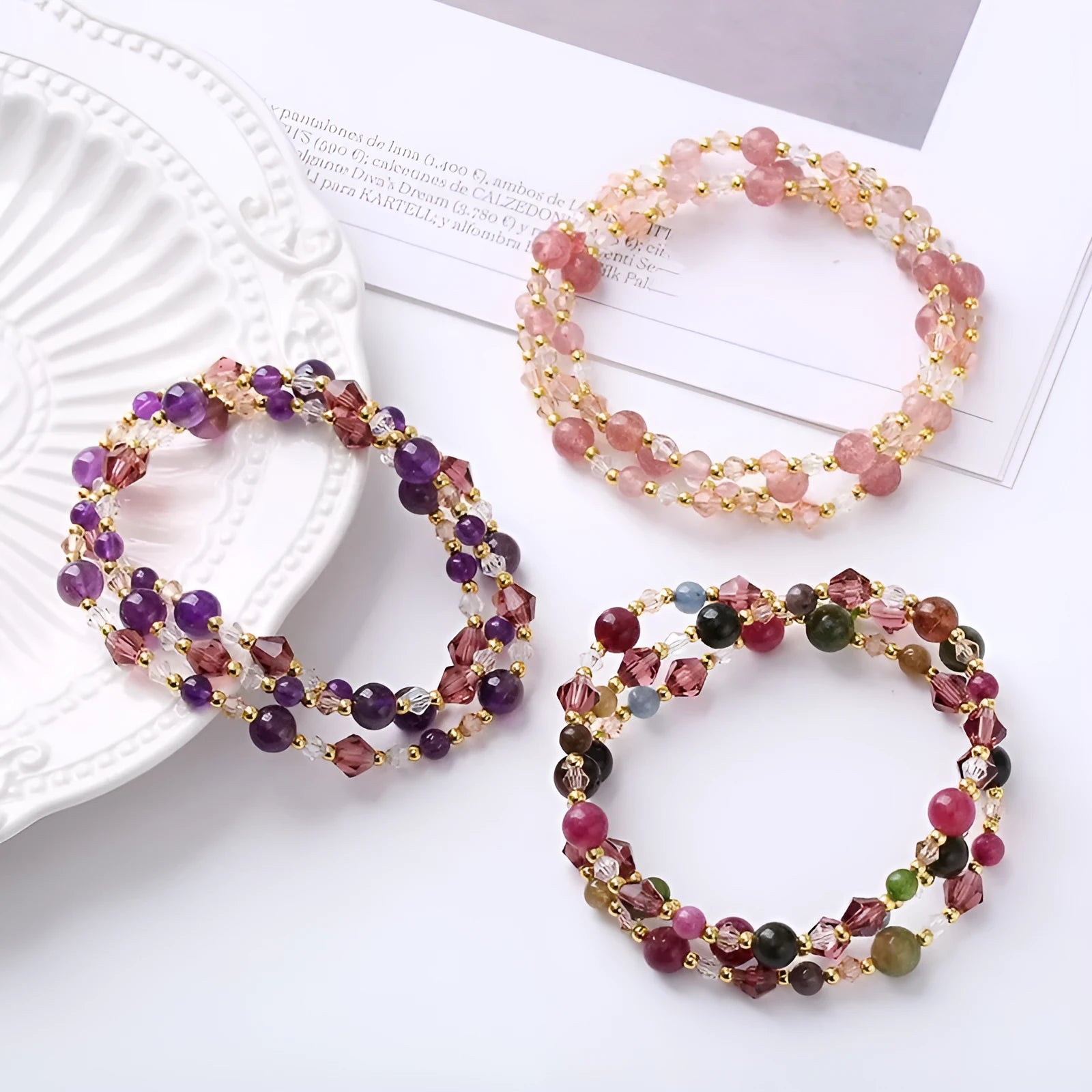 Handmade three-ring crystal bracelet with tourmaline, strawberry quartz and amethyst gemstones