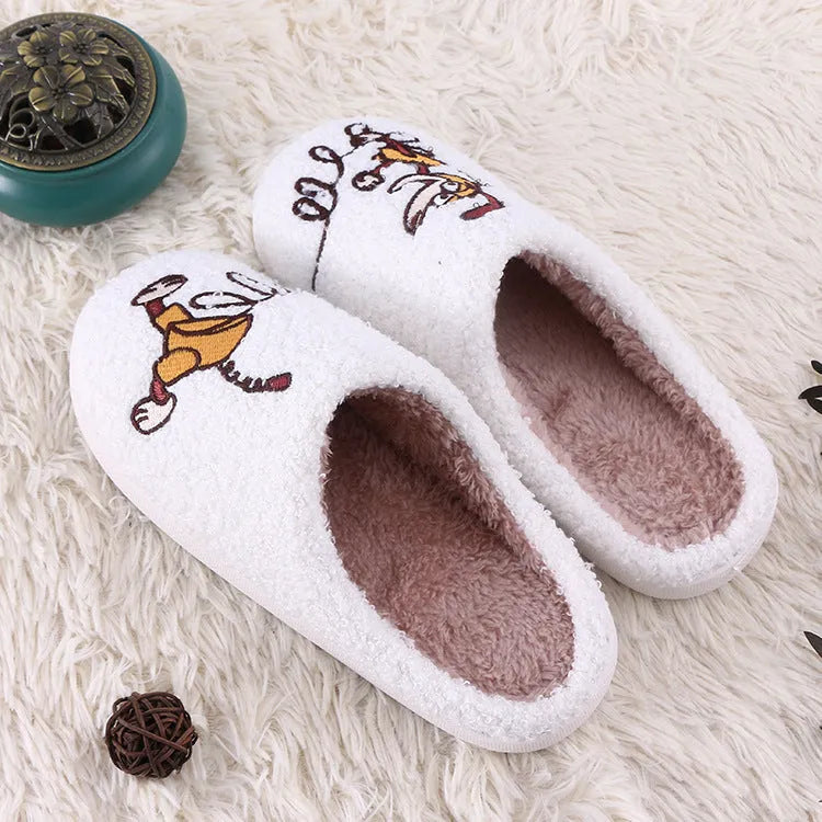 White fluffy cartoon slippers with a non-slip rubber sole and toe holder design