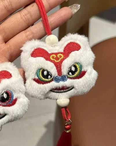 Blue and yellow Chinese style plush lion keychain ornament with tassels and star stone decoration